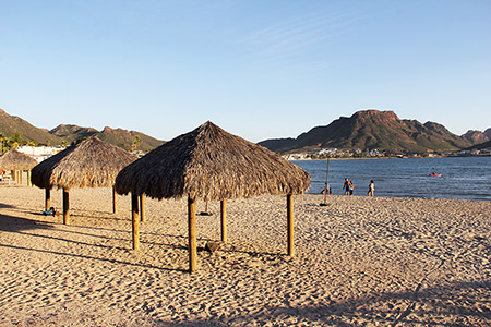 Palapas on the coast of Playa Miramar in Guaymas